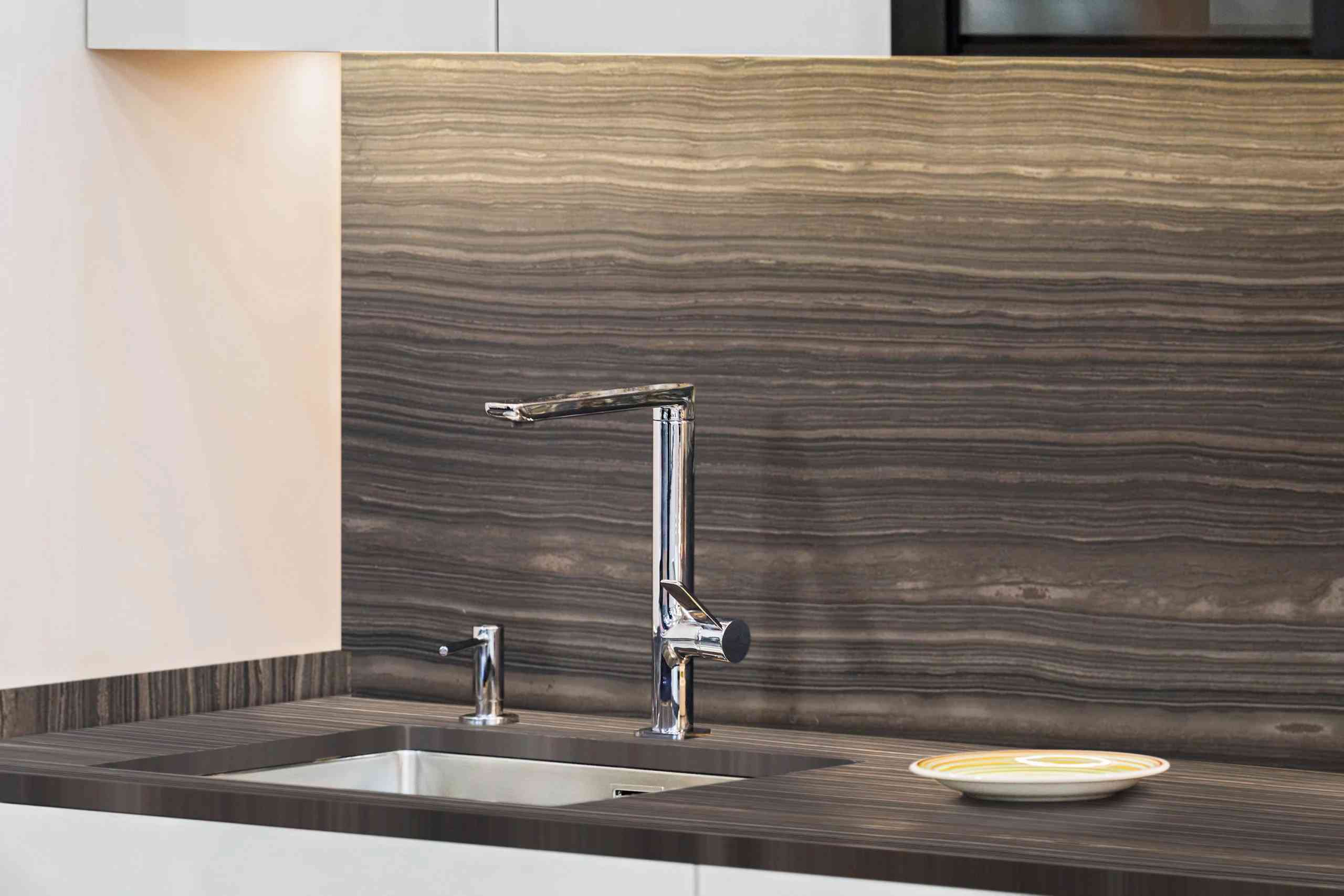 Beautiful modern kitchen design, kitchen faucet, black and gold